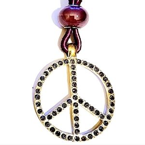 Stainless steel peace symbol pendant amethyst stones on leather